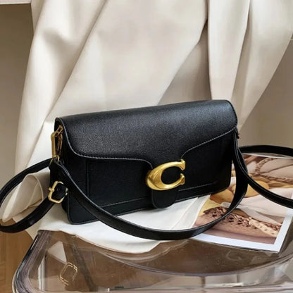 Bolso de hombro moderno de este año con dos correas para el hombro y un bolso pequeño cuadrado diagonal.