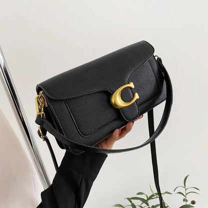 Bolso de hombro moderno de este año con dos correas para el hombro y un bolso pequeño cuadrado diagonal.
