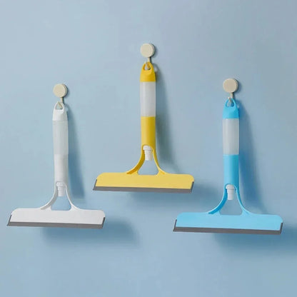 A household glass cleaning scraper that combines the functions of a watering can and a window scraper.