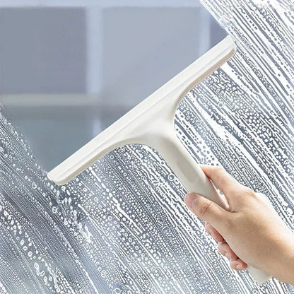 A household glass cleaning scraper that combines the functions of a watering can and a window scraper.